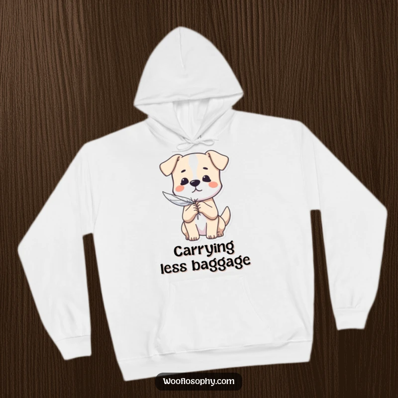 Funny Dog Hoodie: A dog gently cradles a feather, symbolizing a light heart and carefree existence.