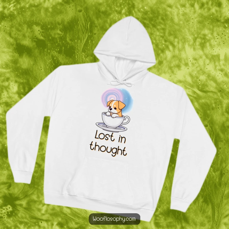 Funny cosmic dog hoodie, a dog gazing into a teacup containing a swirling galaxy, perfect for warmth and thought.