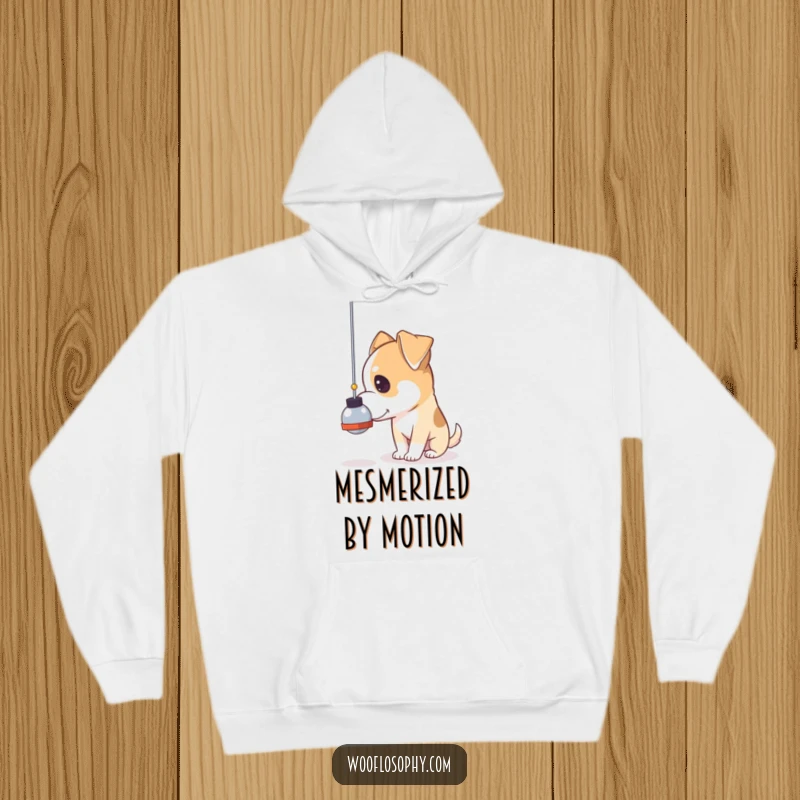Funny pensive dog hoodie, a dog gazing thoughtfully at a swinging pendulum, comfortable for reflection.
