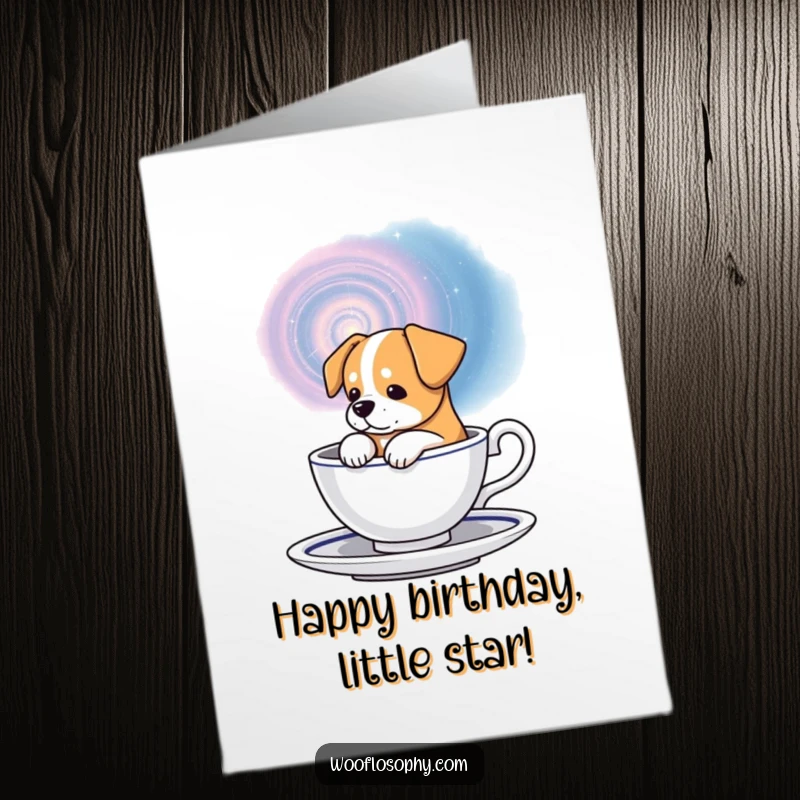 Funny Free Printable Birthday Card: Dog peers into a teacup swirling with a miniature galaxy, looking thoughtful.