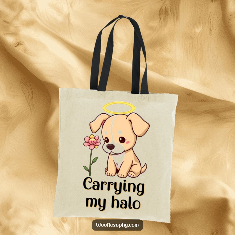 Funny Dog Tote Bag: A dog with a halo looks thoughtfully at a blooming flower, symbolizing inner beauty.